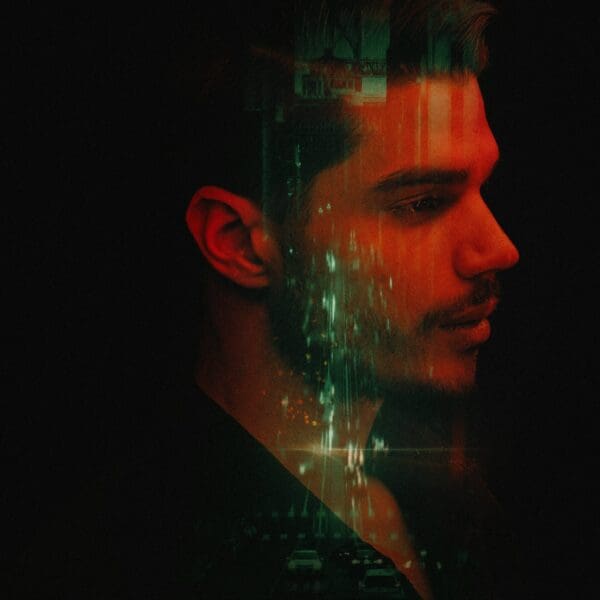 a man with glowing light on her face