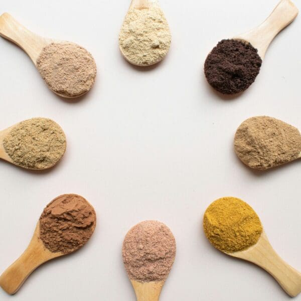 Scoops showing eight various supplemental powders